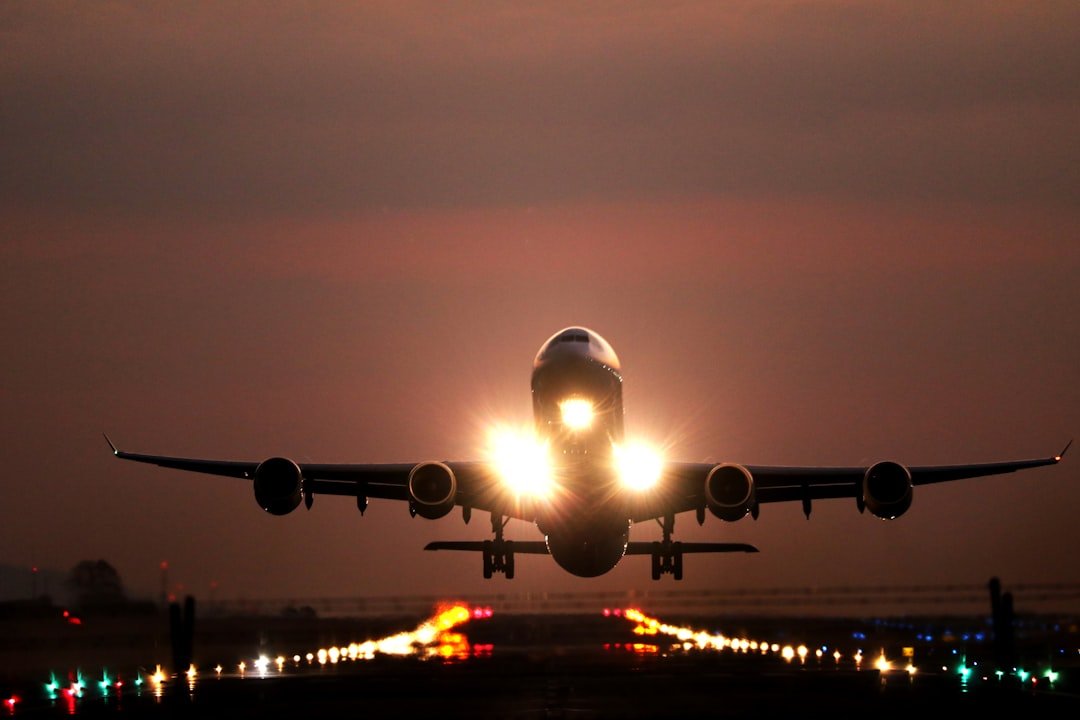 Airplane on the tarmac at sunset