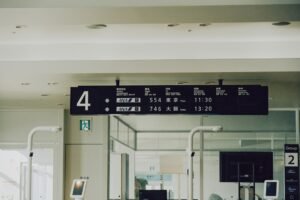 Airport departure board showing flight information