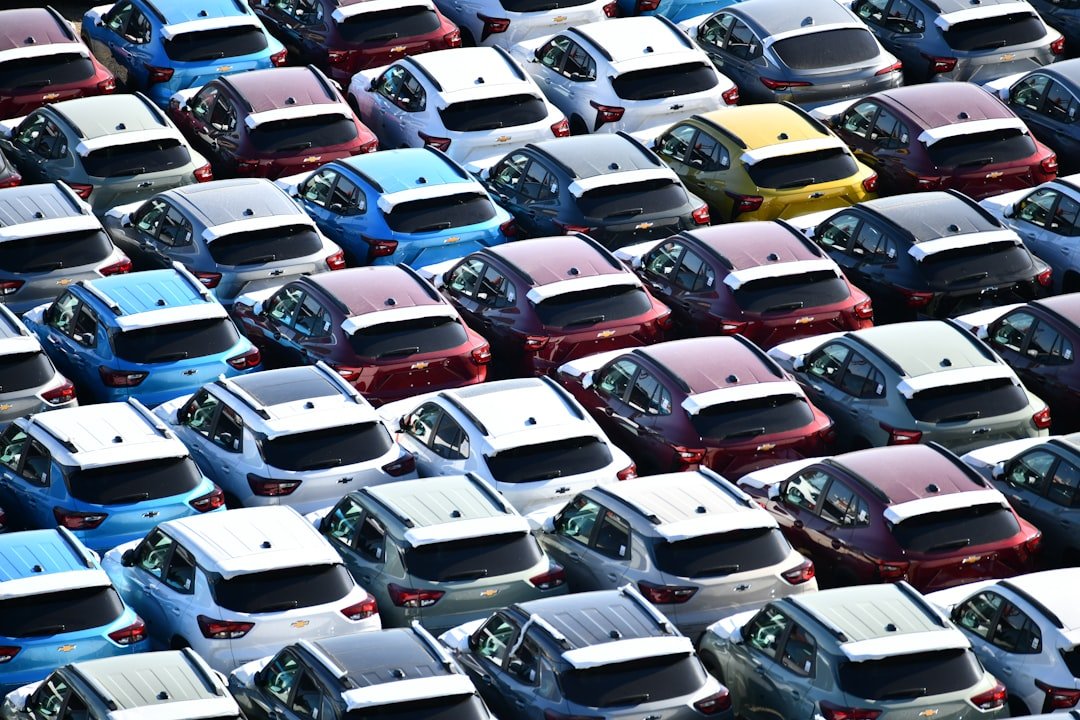 Rows of trucks parked on a dealership lot