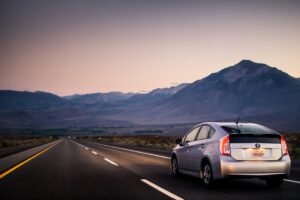 Sedan car driving on an open highway